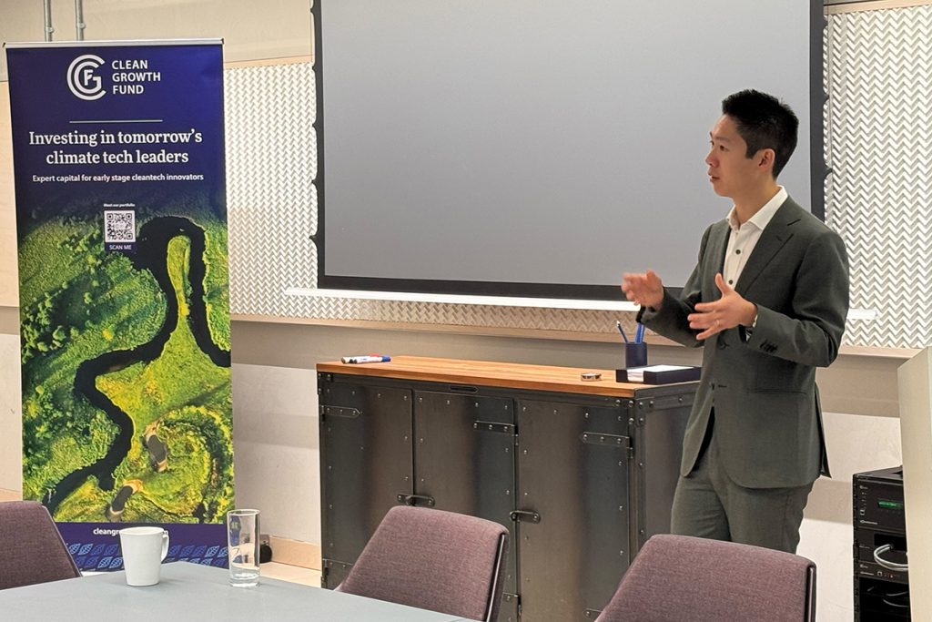 Image of founder giving presentation on the portfolio day